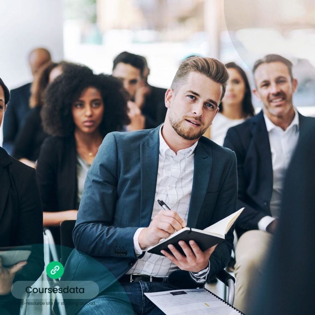 Business professionals attending a seminar.