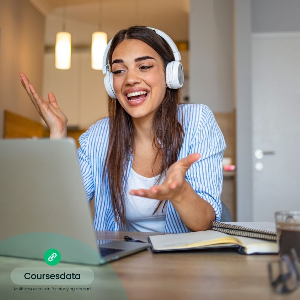 Smiling woman engaged in online conversation.