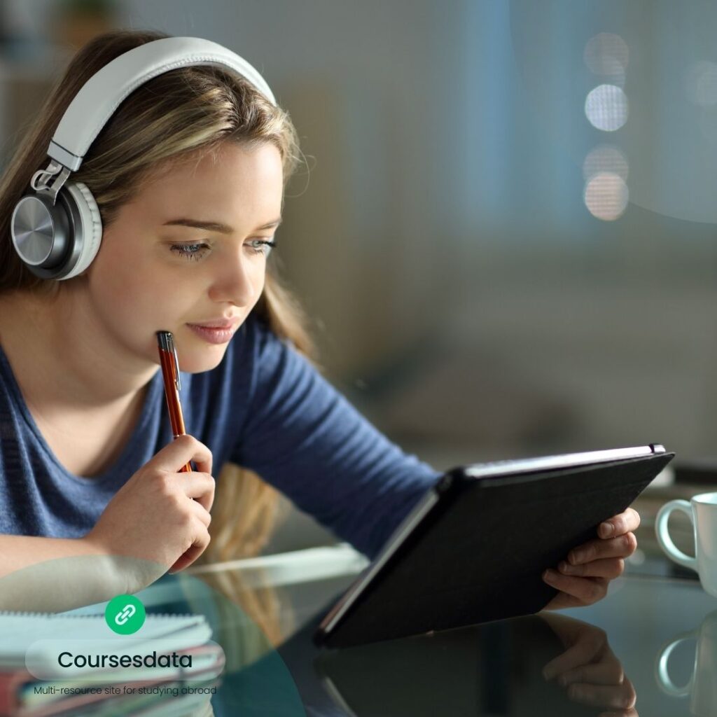 Young woman studying with tablet.