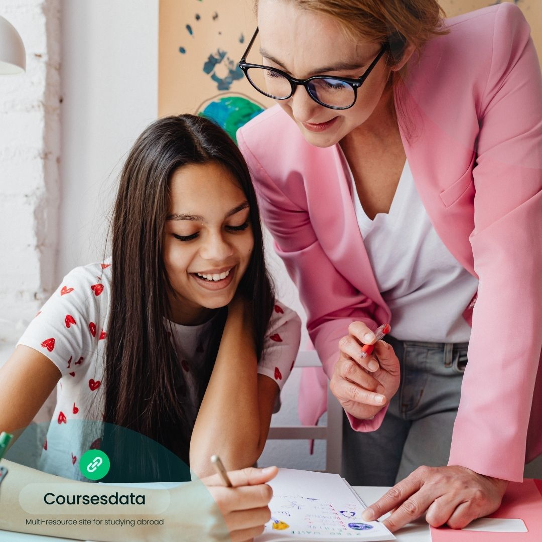 Teacher assisting student with homework.