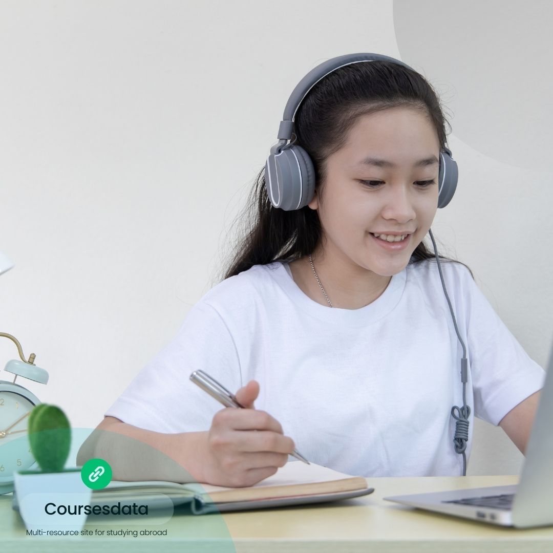 Student studying with headphones.