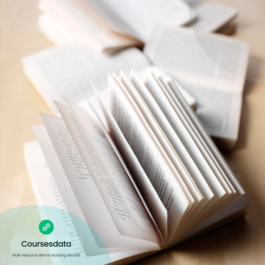 Open books on a table.