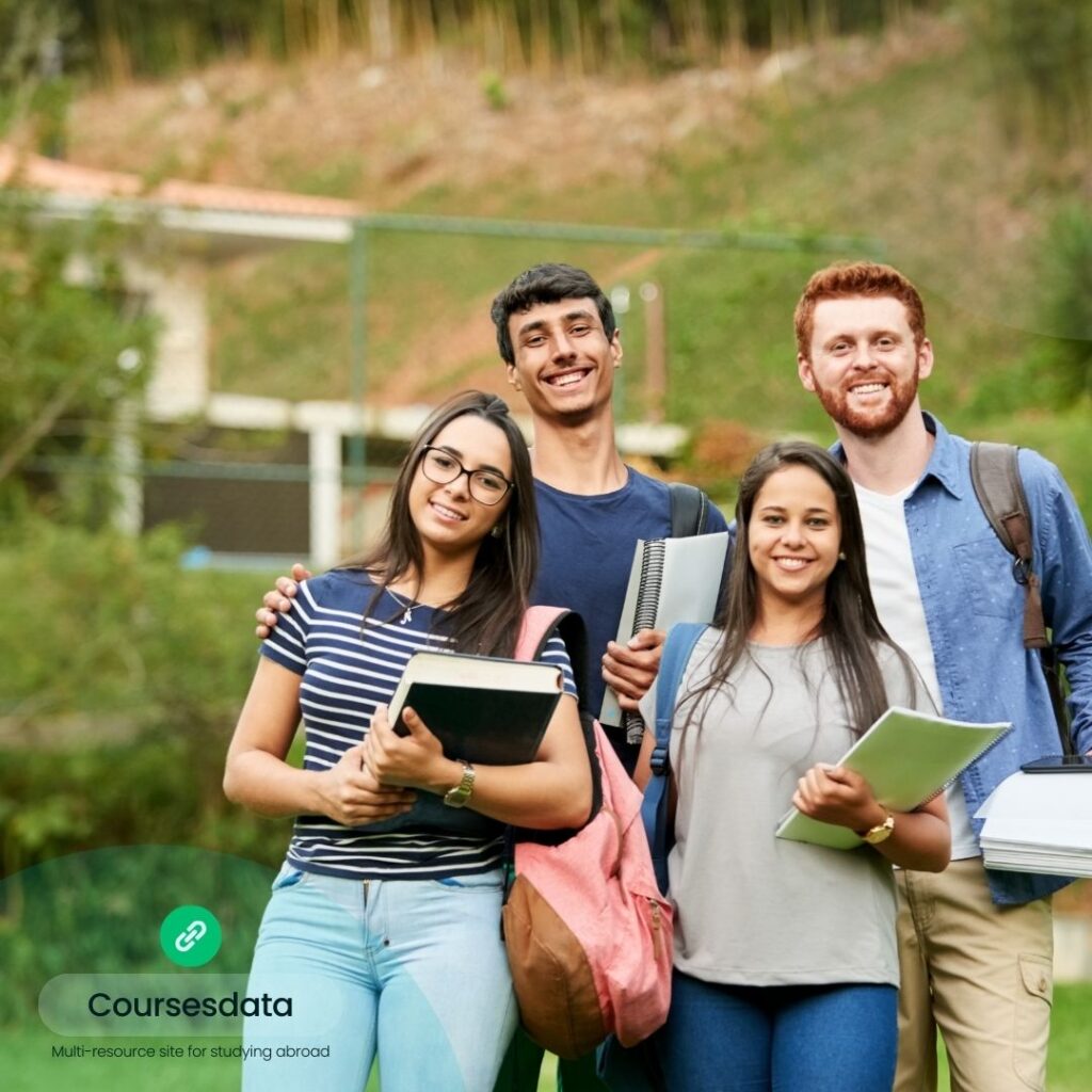 Group of students outdoors smiling.