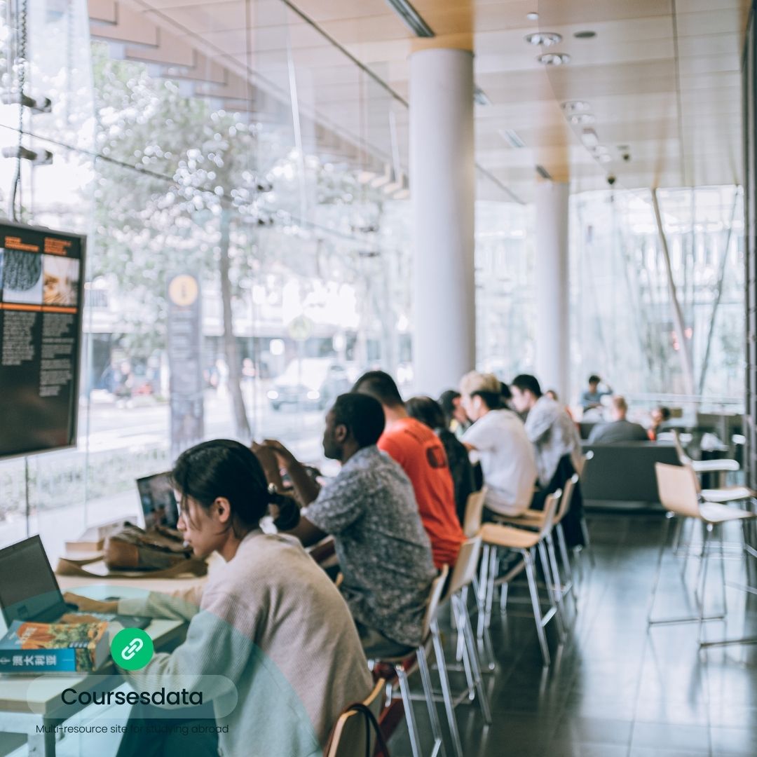 Café with people working collaboratively.