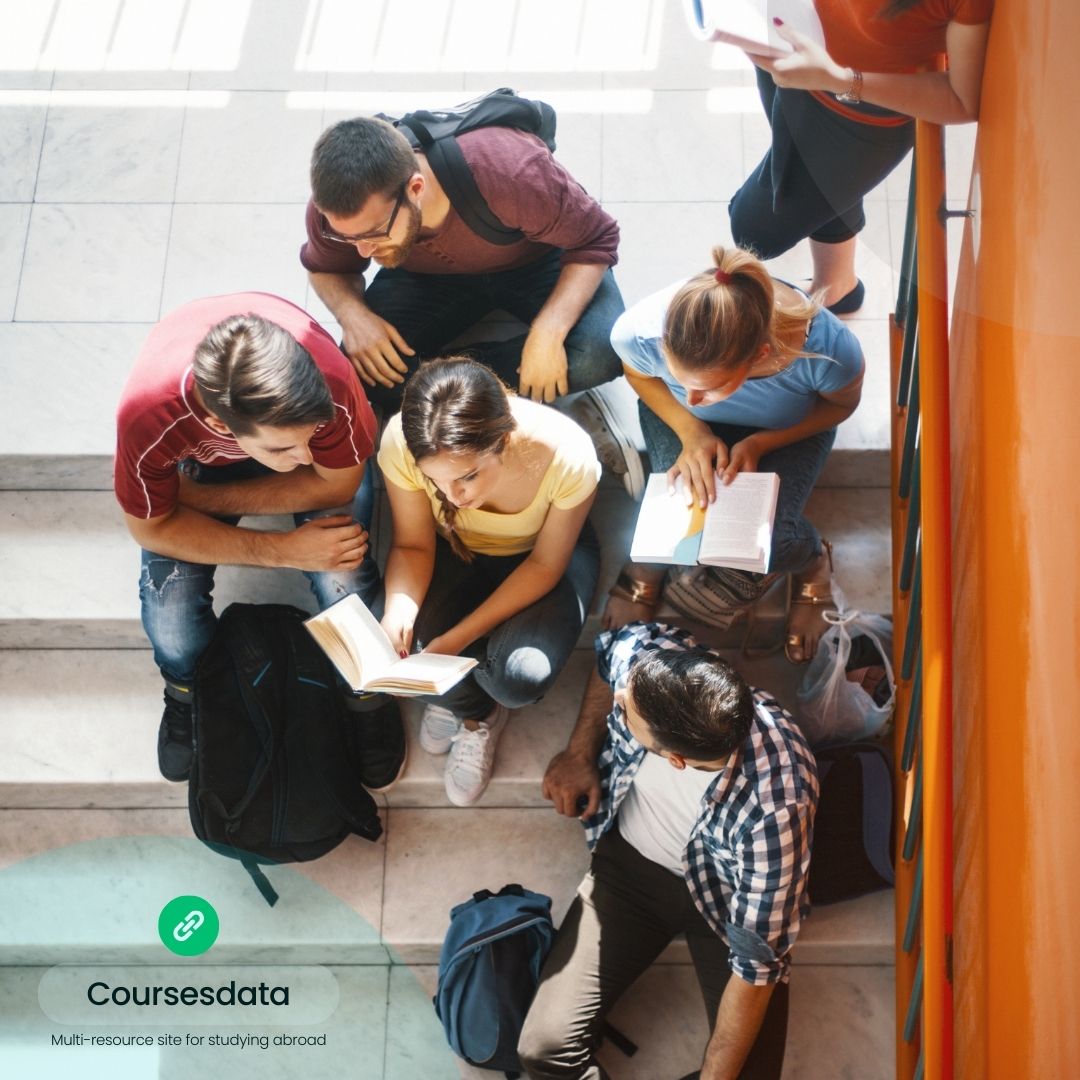 Students studying on staircase together.