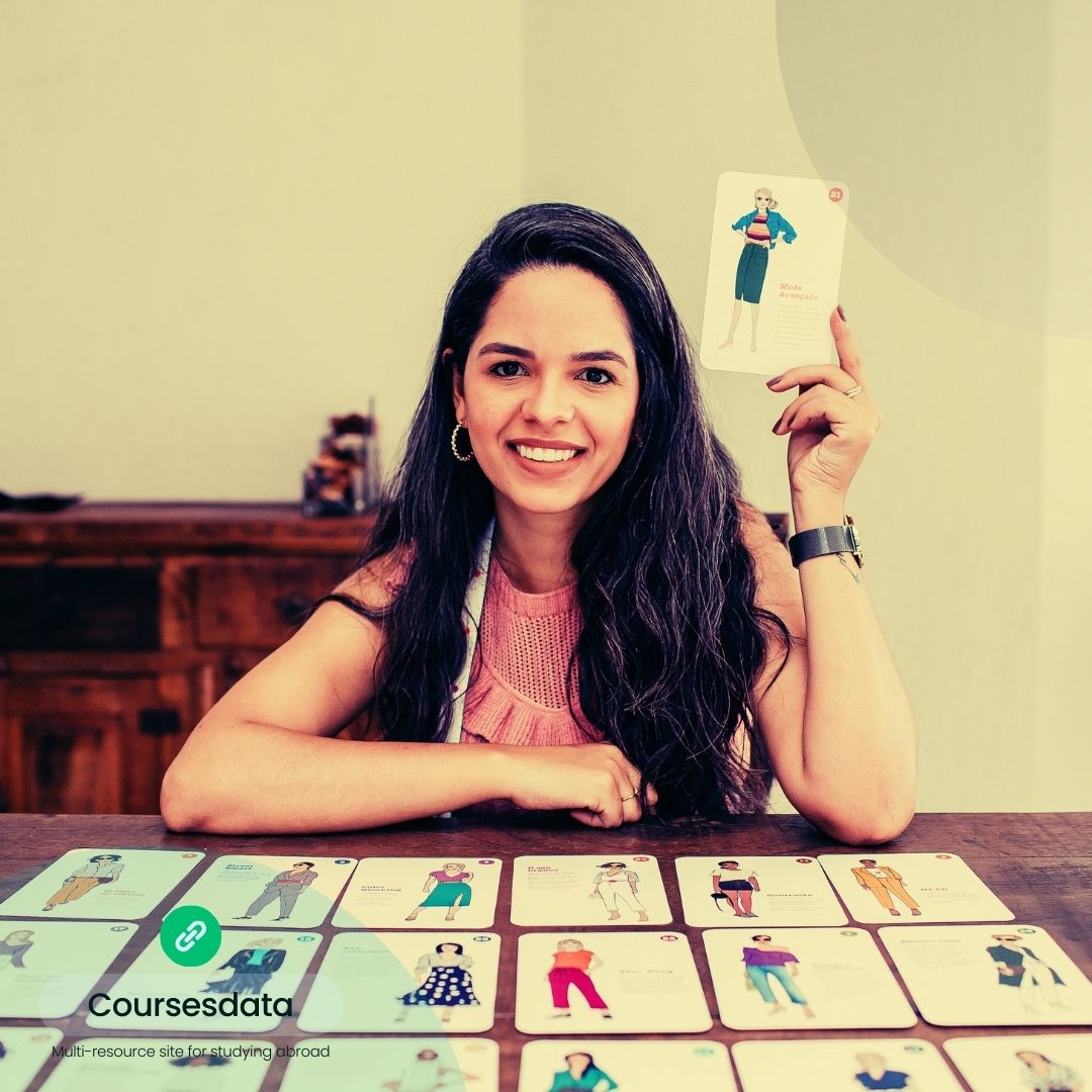 Woman smiling with style cards.