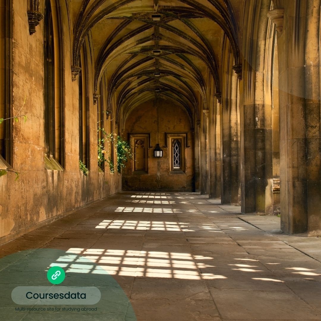 Historic corridor with arched ceiling.