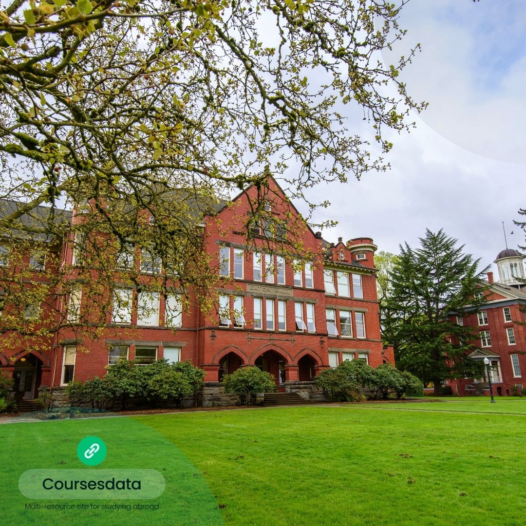 Historic brick building, green lawn.