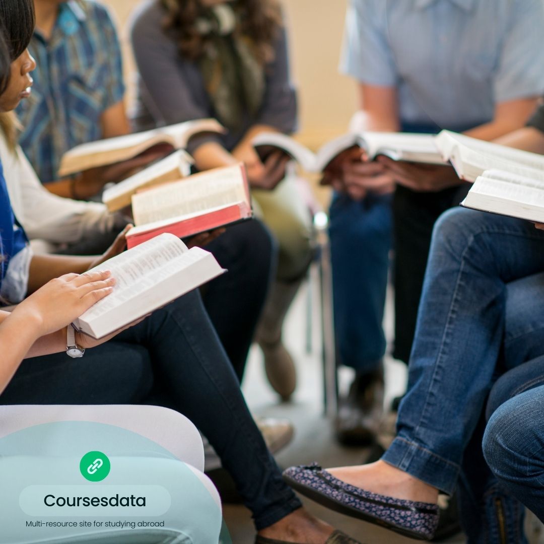 Group studying with open books.
