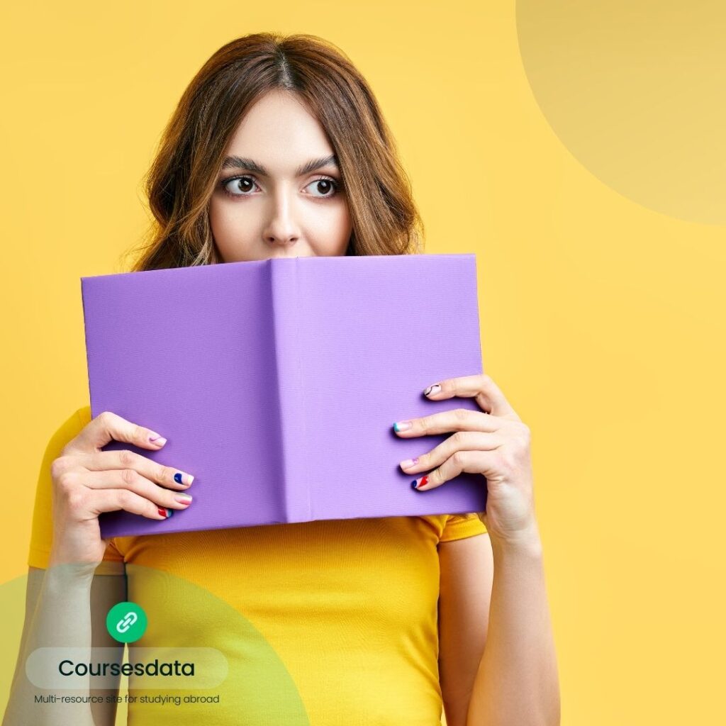 Woman reading purple book, yellow background.