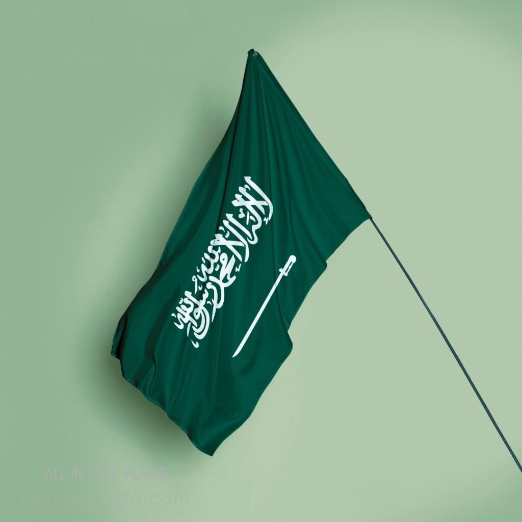 Green flag with Arabic text.